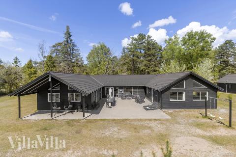 Dette lekre huset med svømmebasseng, nr. 351, med plass til 22 personer, ligger i Nordsjælland
