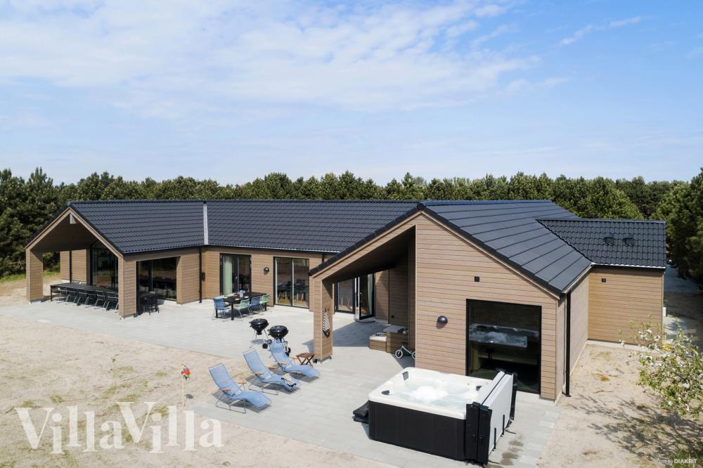Nyt en grillkveld på terrassen i luksushus nr. 934 i Lolland/Falster/Møn