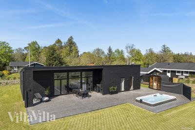 Dette lekre huset med spa, nr. 977, med plass til 10 personer, ligger i Nordjylland