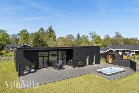 Dette lekre huset med spa, nr. 977, med plass til 10 personer, ligger i Nordjylland