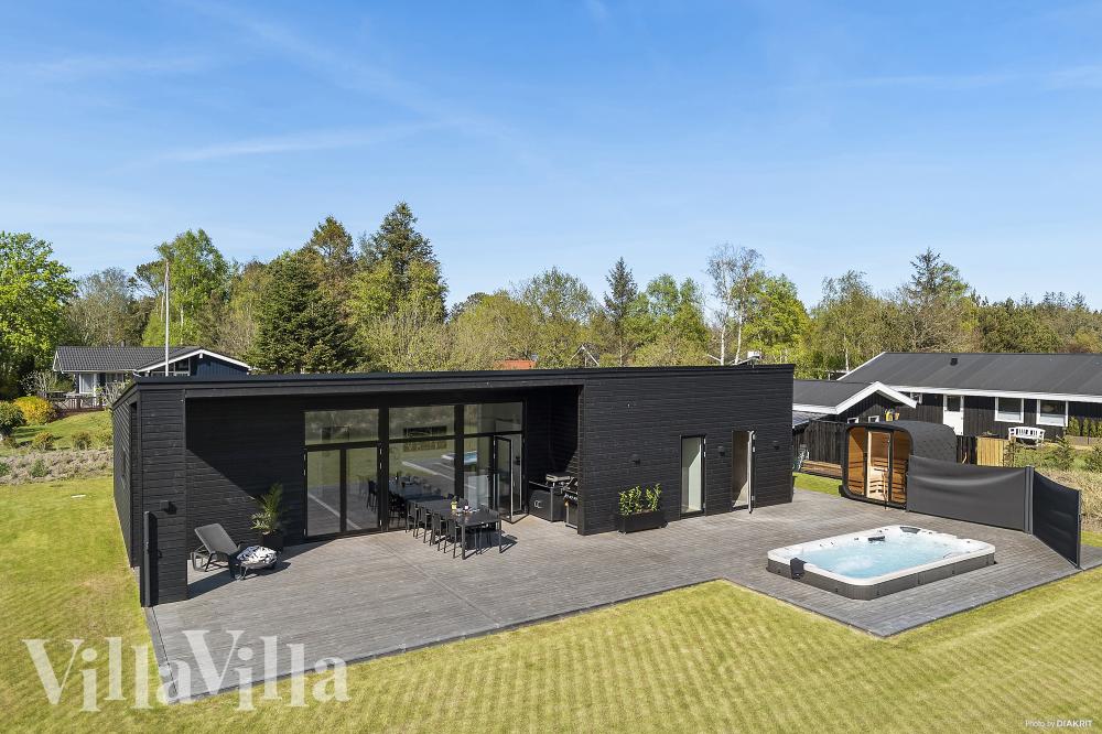 Dette lekre huset med spa, nr. 977, med plass til 10 personer, ligger i Nordjylland