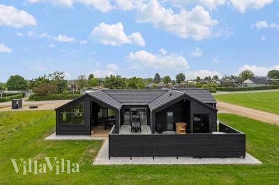 Dette lekre huset med spa, nr. 955, med plass til 12 personer, ligger i Fyn og øyer