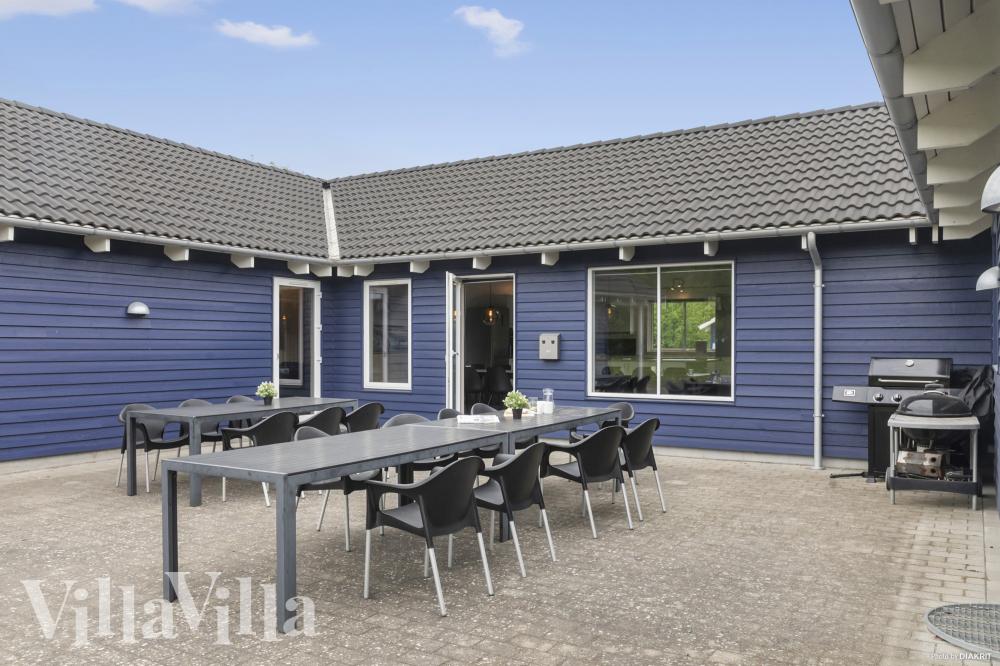 Nyt en grillkveld på terrassen i luksushus nr. 314 i Lolland/Falster/Møn