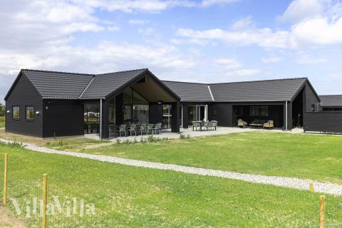 Dette lekre huset med svømmebasseng, nr. 932, med plass til 20 personer, ligger i Fyn og øyer