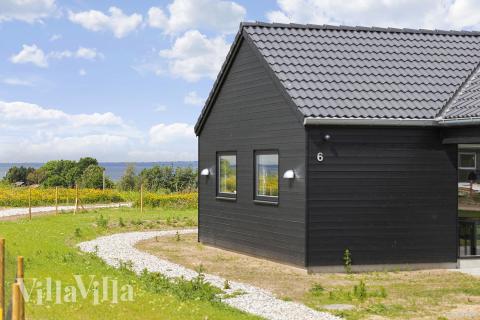 Det vakre området Fyn og øyer innbyr til et opphold i luksushus nr. 932.