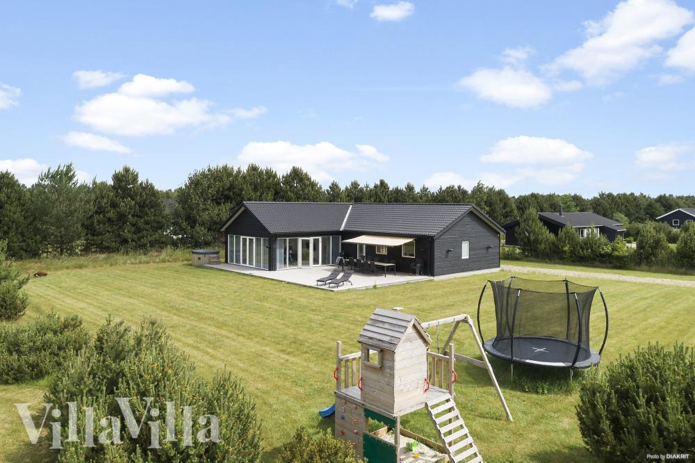 Luksushus nr. 969 har en deilig terrasse med gode hagemøbler til 12 personer.