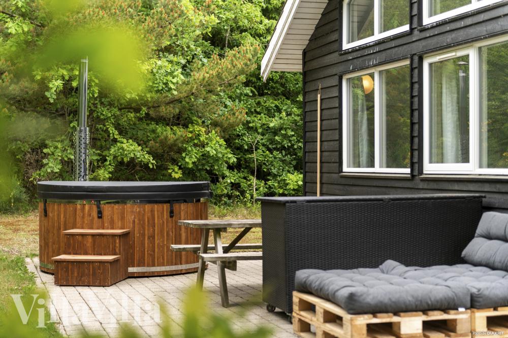 Nyt varmen i boblebadet i luksushus nr. 313 i Vestjylland