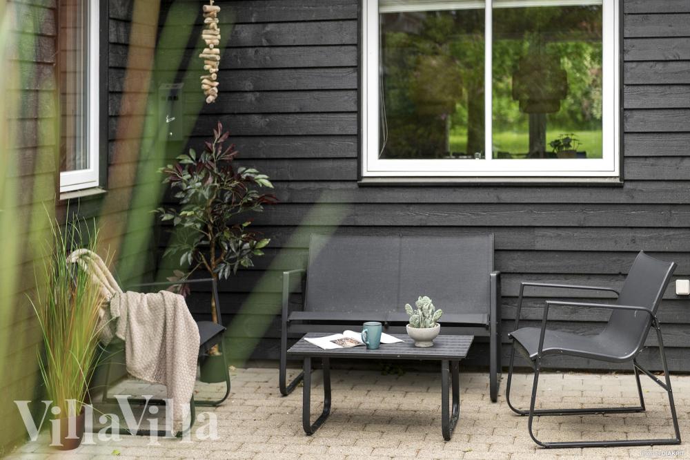 Nyt en grillkveld på terrassen i luksushus nr. 313 i Vestjylland