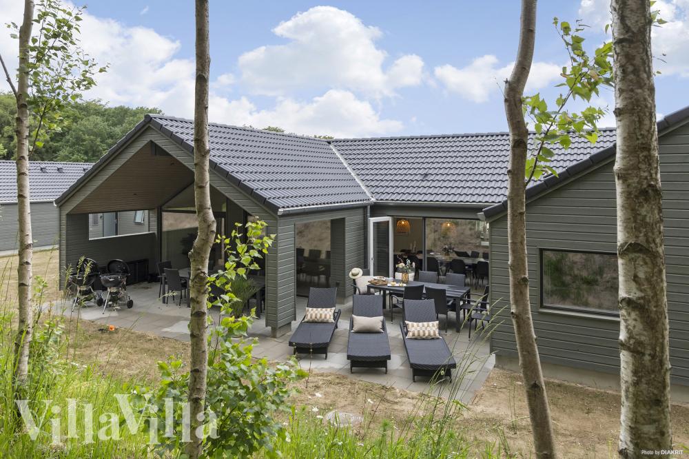 Dette lekre huset med svømmebasseng, nr. 832, med plass til 18 personer, ligger i Østjylland
