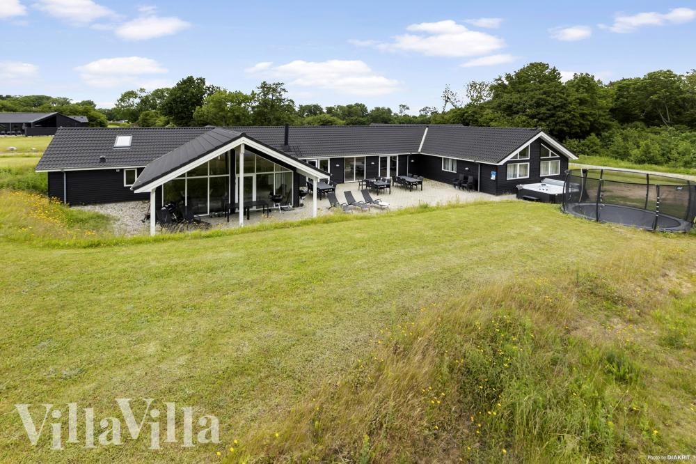 Dette lekre huset med svømmebasseng, nr. 491, med plass til 30 personer, ligger i Sydjylland