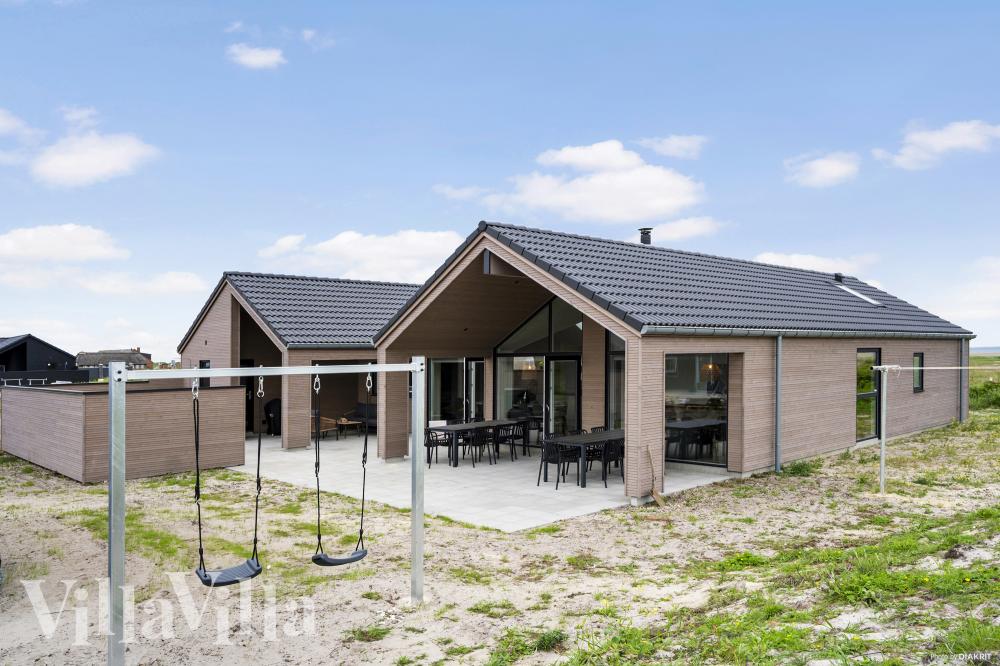 Dette lekre huset med svømmebasseng, nr. 930, med plass til 14 personer, ligger i Vestjylland