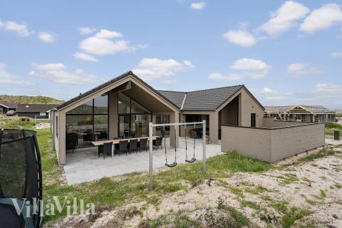 Dette lekre huset med svømmebasseng, nr. 929, med plass til 14 personer, ligger i Vestjylland