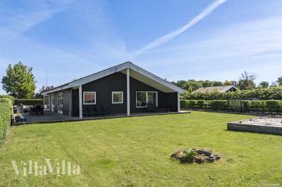 Dette lekre huset med svømmebasseng, nr. 980, med plass til 14 personer, ligger i Østjylland