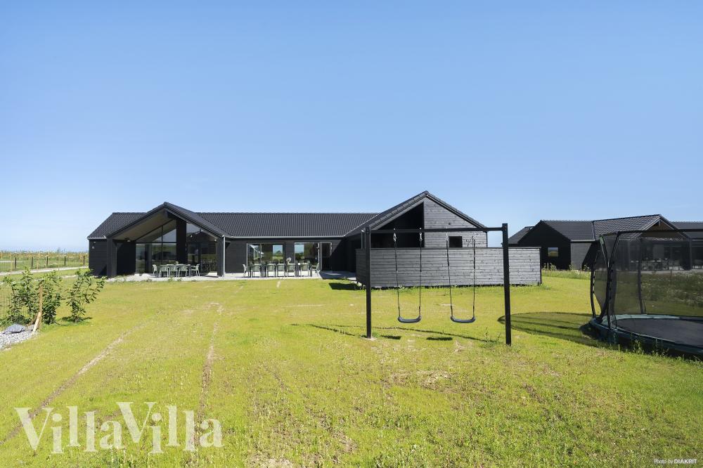 Dette lekre huset med svømmebasseng, nr. 932, med plass til 20 personer, ligger i Fyn og øyer
