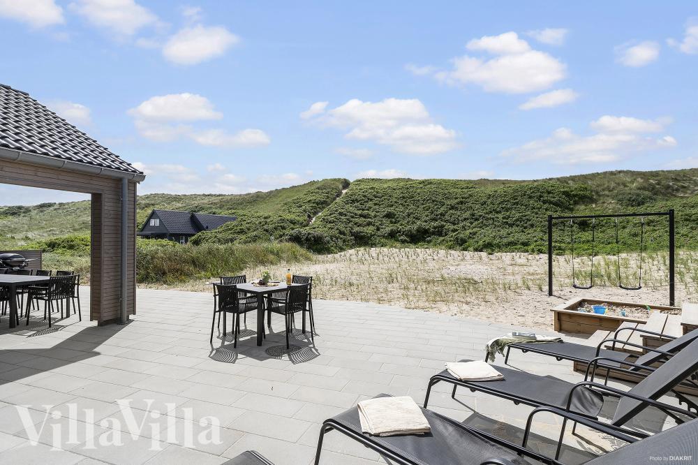Luksushus nr. 900 har en deilig terrasse med gode hagemøbler til 18 personer.