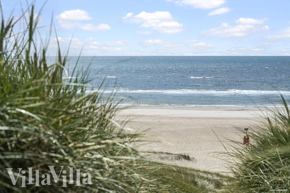 Stranden nær luksushus nr. 900.