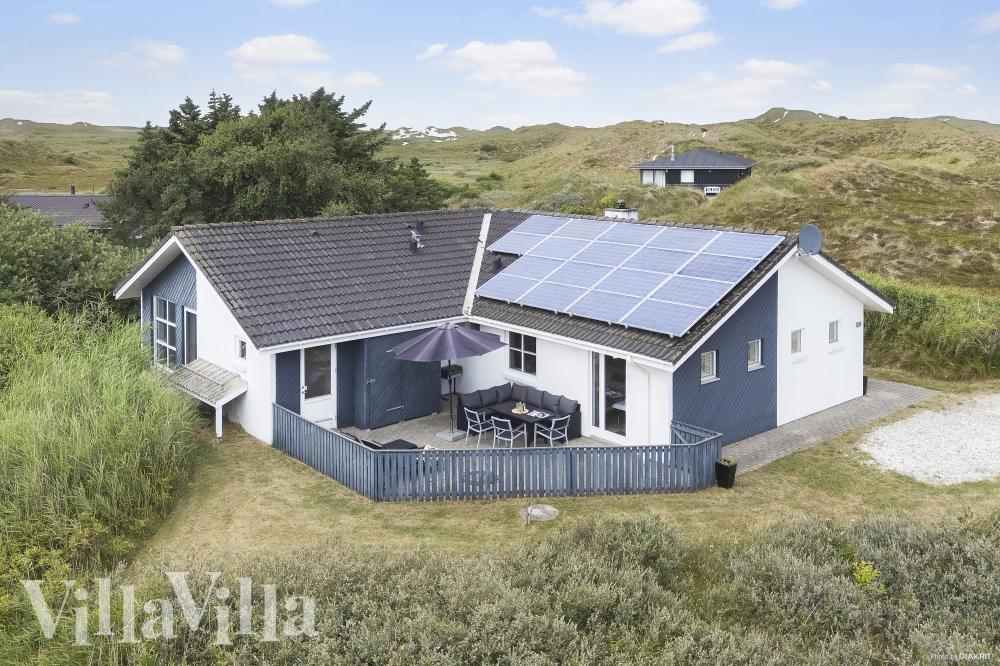 Dette lekre huset med svømmebasseng, nr. 974, med plass til 8 personer, ligger i Vestjylland