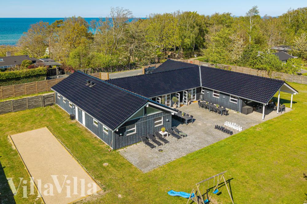 Dette lekre huset med svømmebasseng, nr. 991, med plass til 30 personer, ligger i Nordsjælland