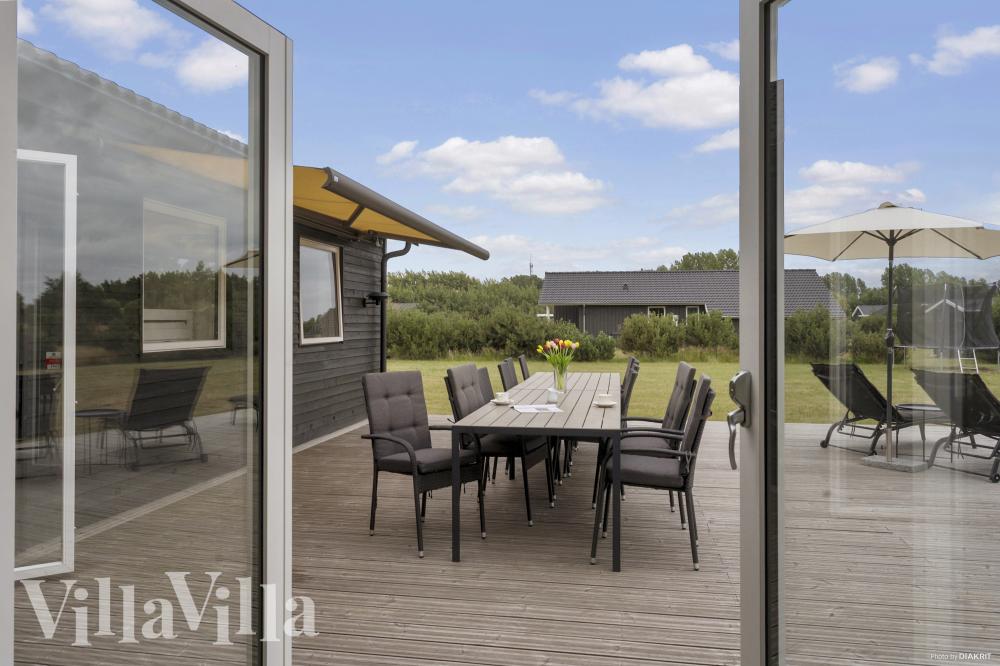 Luksushus nr. 969 har en deilig terrasse med gode hagemøbler til 12 personer.