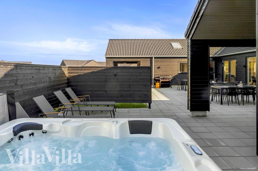 Nyt varmen i boblebadet i luksushus nr. 1001 i Lolland/Falster/Møn