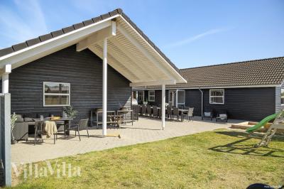 Dette lekre huset med svømmebasseng, nr. 196, med plass til 22 personer, ligger i Nordjylland