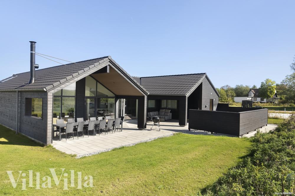 Dette lekre huset med svømmebasseng, nr. 617, med plass til 14 personer, ligger i Fyn og øyer