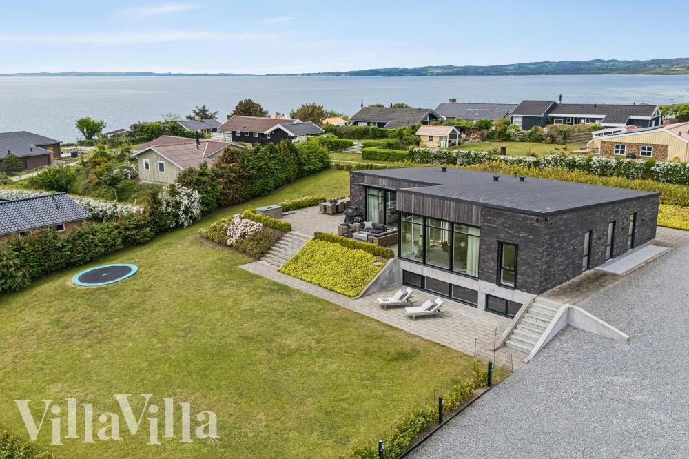 Dette lekre huset med svømmebasseng, nr. 1022, med plass til 26 personer, ligger i Østjylland