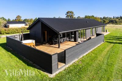 Dette lekre huset med spa, nr. 1029, med plass til 12 personer, ligger i Nordjylland