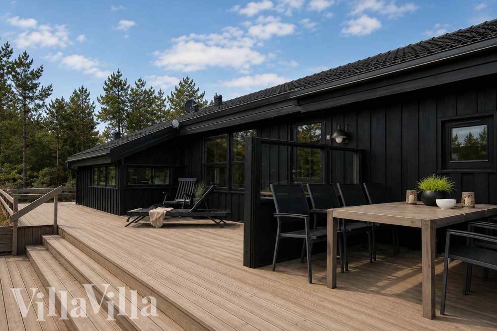Luksushus nr. 1010 har en deilig terrasse med gode hagemøbler til 16 personer.