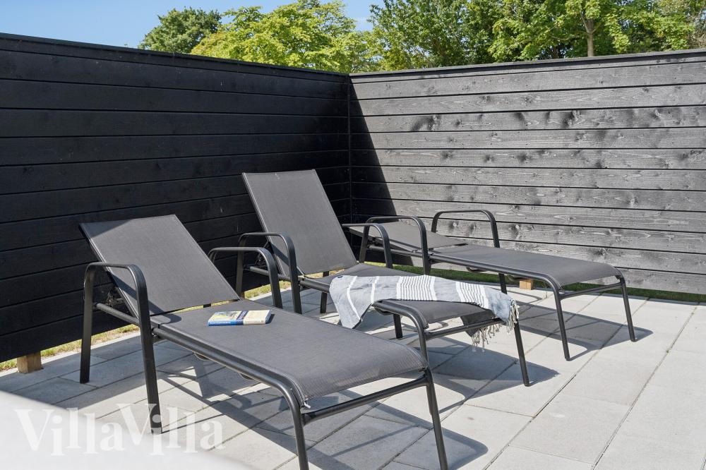 Nyt en grillkveld på terrassen i luksushus nr. 1026 i Fyn og øyer